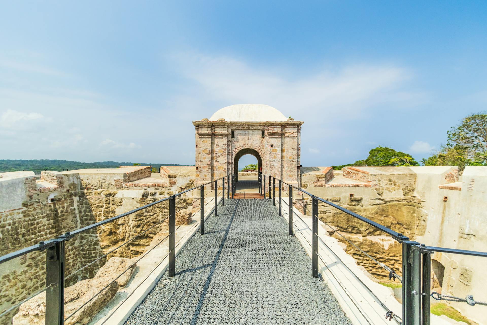 Explore the historic Fort San Lorenzo set against the lush backdrop of Chagres National Park in Panama.