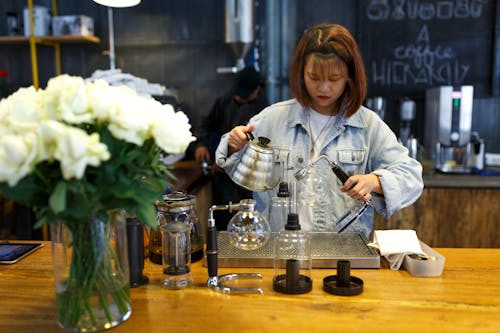Woman Mixing Beverages