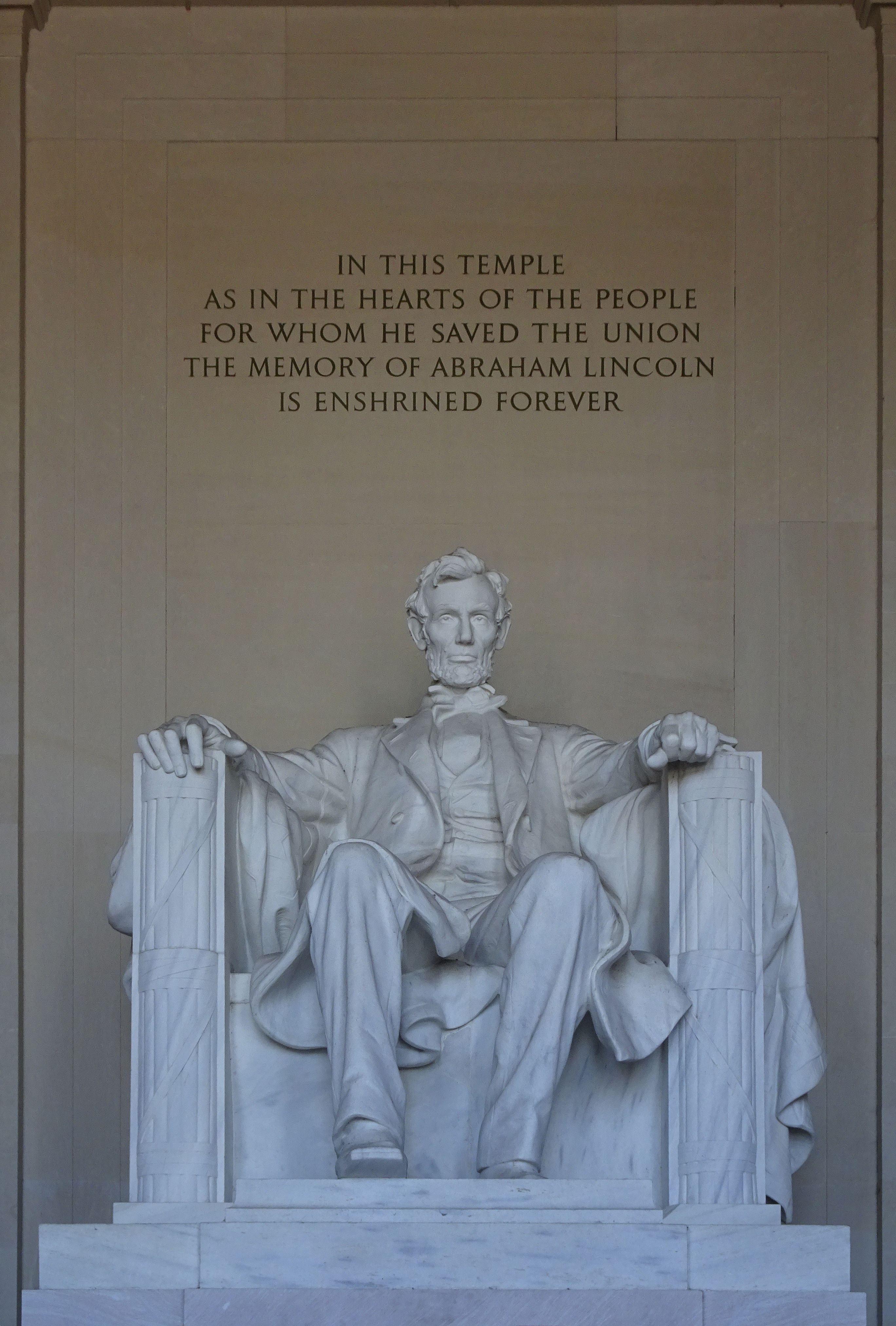 Iconic Abraham Lincoln statue inside the Lincoln Memorial in Washington, capturing historical significance.