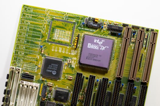Close-up view of a vintage Intel i486 DX motherboard, highlighting retro technology.