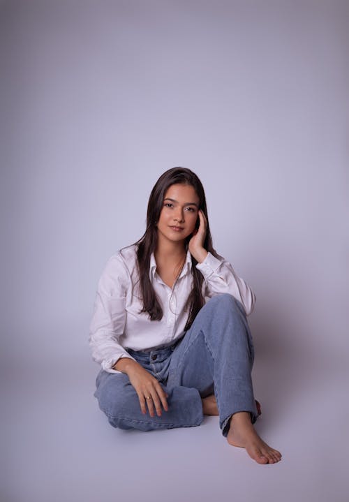 Free Brunette Woman Sitting in Shirt Stock Photo