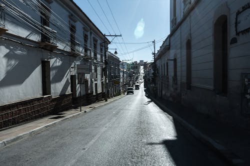 şehir sokakları, şehirde gündoğumu içeren Ücretsiz stok fotoğraf