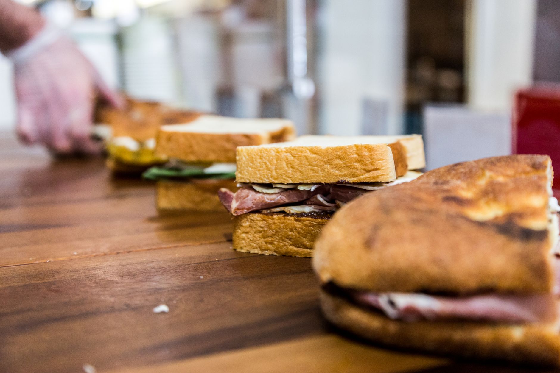 Close-up of a Soppressata Sandwich with fresh arugula