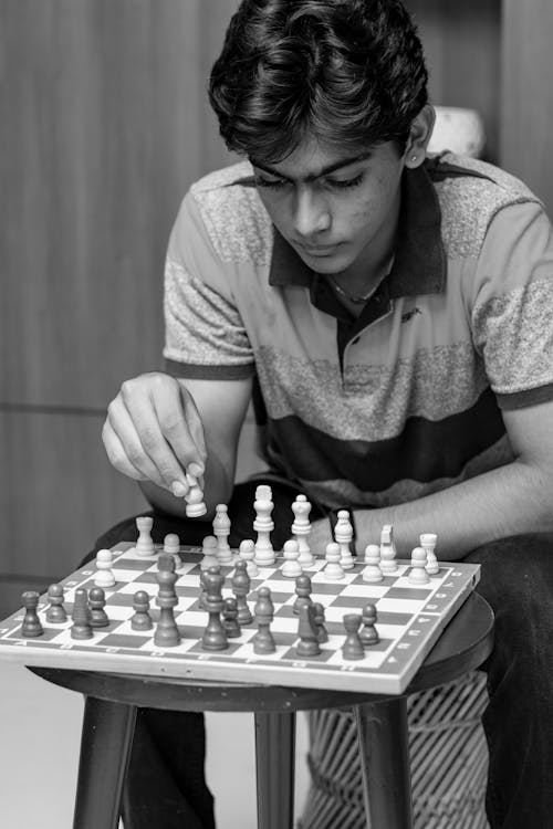 Teen playing chess