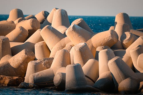 A pile of concrete blocks on the beach