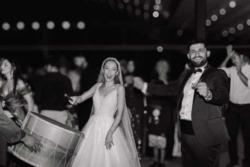 Free A bride and groom dancing at their wedding reception Stock Photo