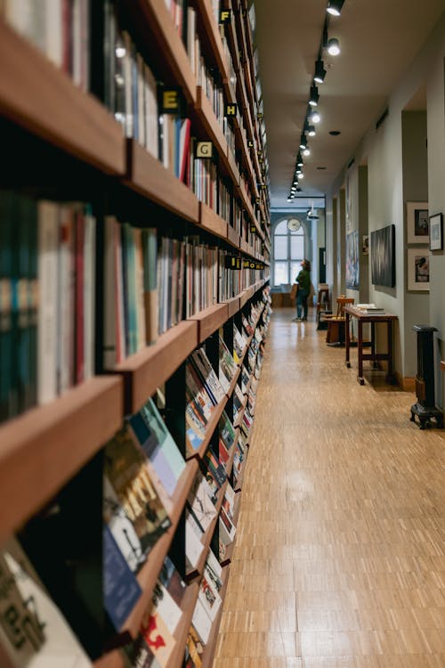 Free A long aisle with books on it Stock Photo