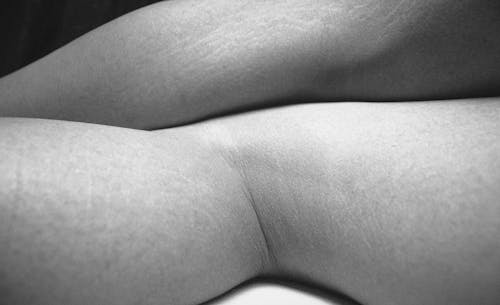 Free A black and white photo of a woman's legs Stock Photo