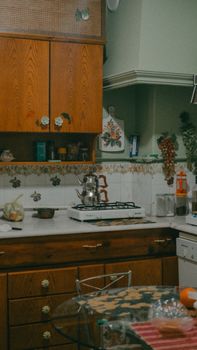 Cozy vintage kitchen in Eskişehir, Türkiye with retro stove and Turkish kettle. Perfect for nostalgia lovers.