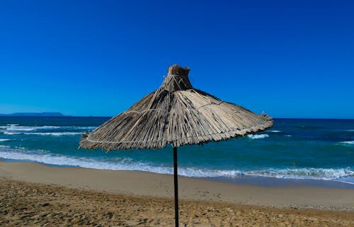 Gratis arkivbilde med parasoll, sommer, strand