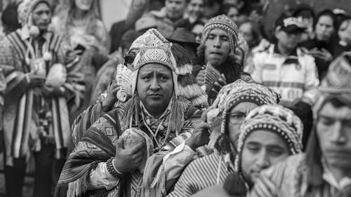 A black and white photo of a group of people