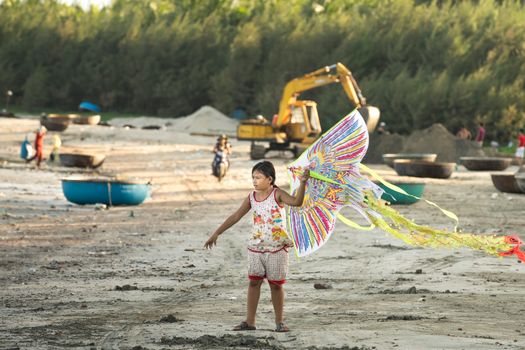 Girl Holding Kite 