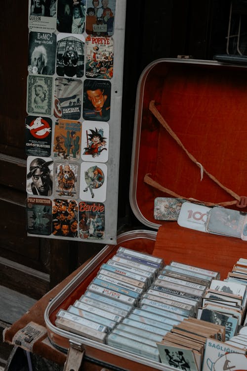 An open suitcase with a bunch of cards inside