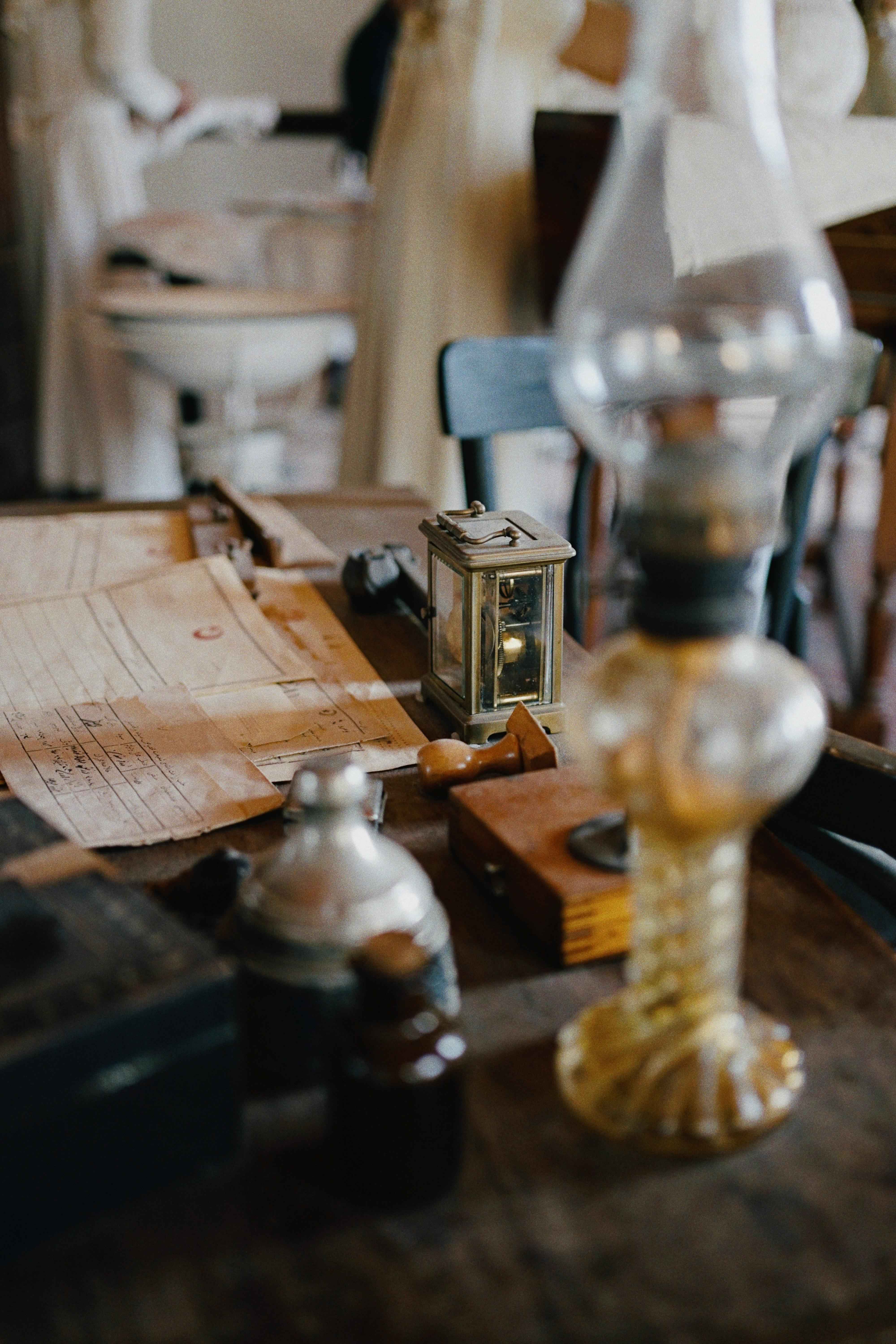Classic vintage kerosene lamps on a wooden table create a nostalgic ambiance.