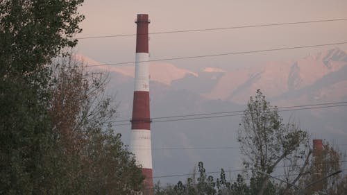 boiler room pipe in Almaty against the background of mountains