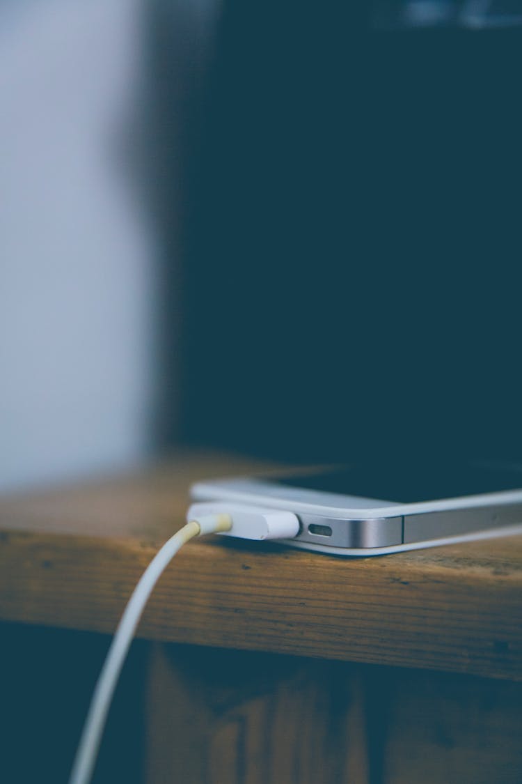 Silver Iphone 6 On Brown Wooden Table