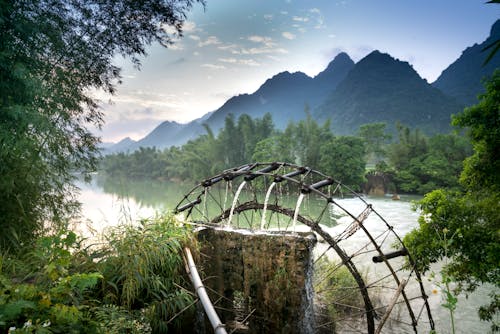 Landscape Photo of Mountains Near Body of Water