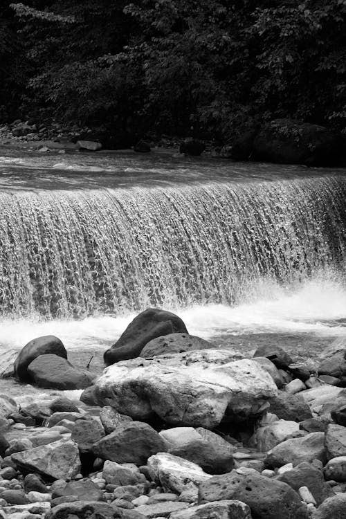 Black and white photograph of a waterfall