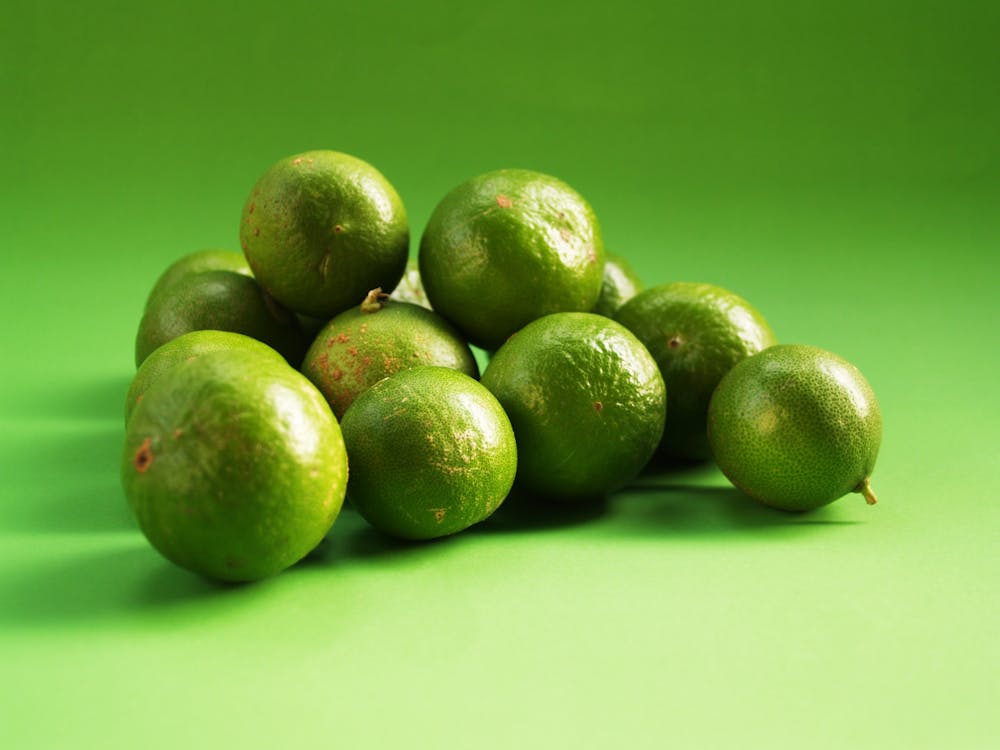 Free Pile of Green Lime Fruits Stock Photo