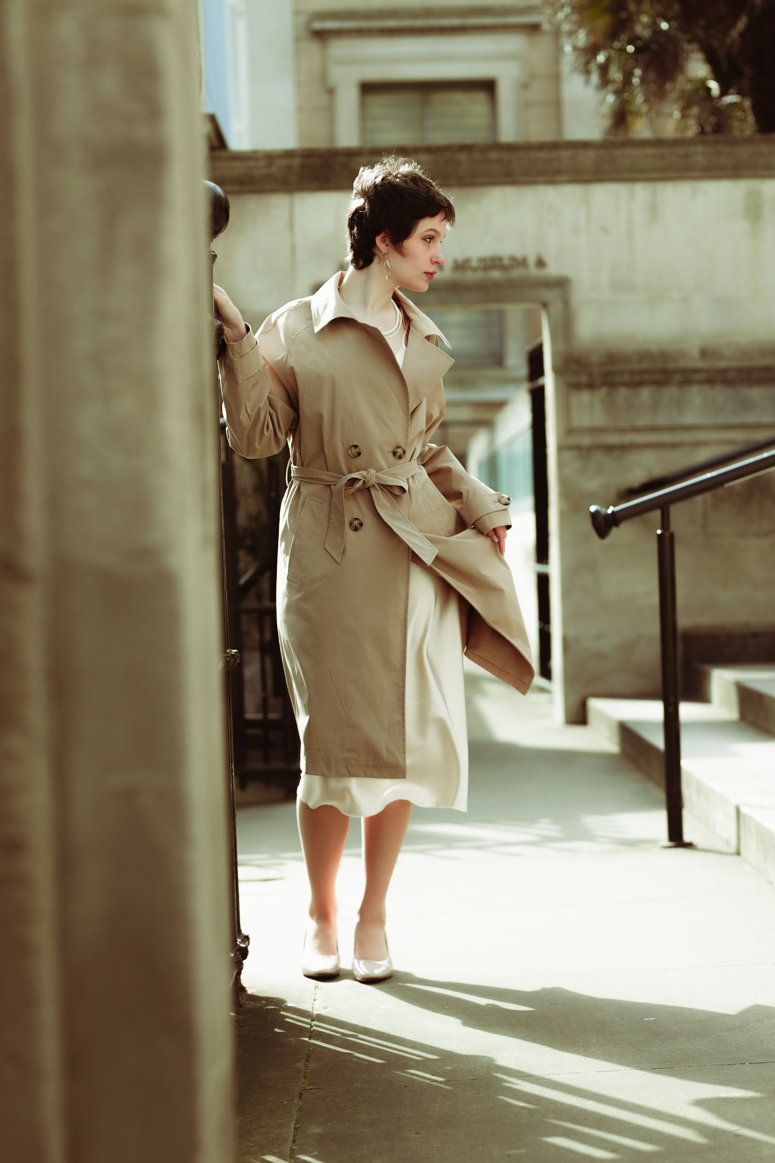 Young Woman in a Gray Trench Coat · Free Stock Photo