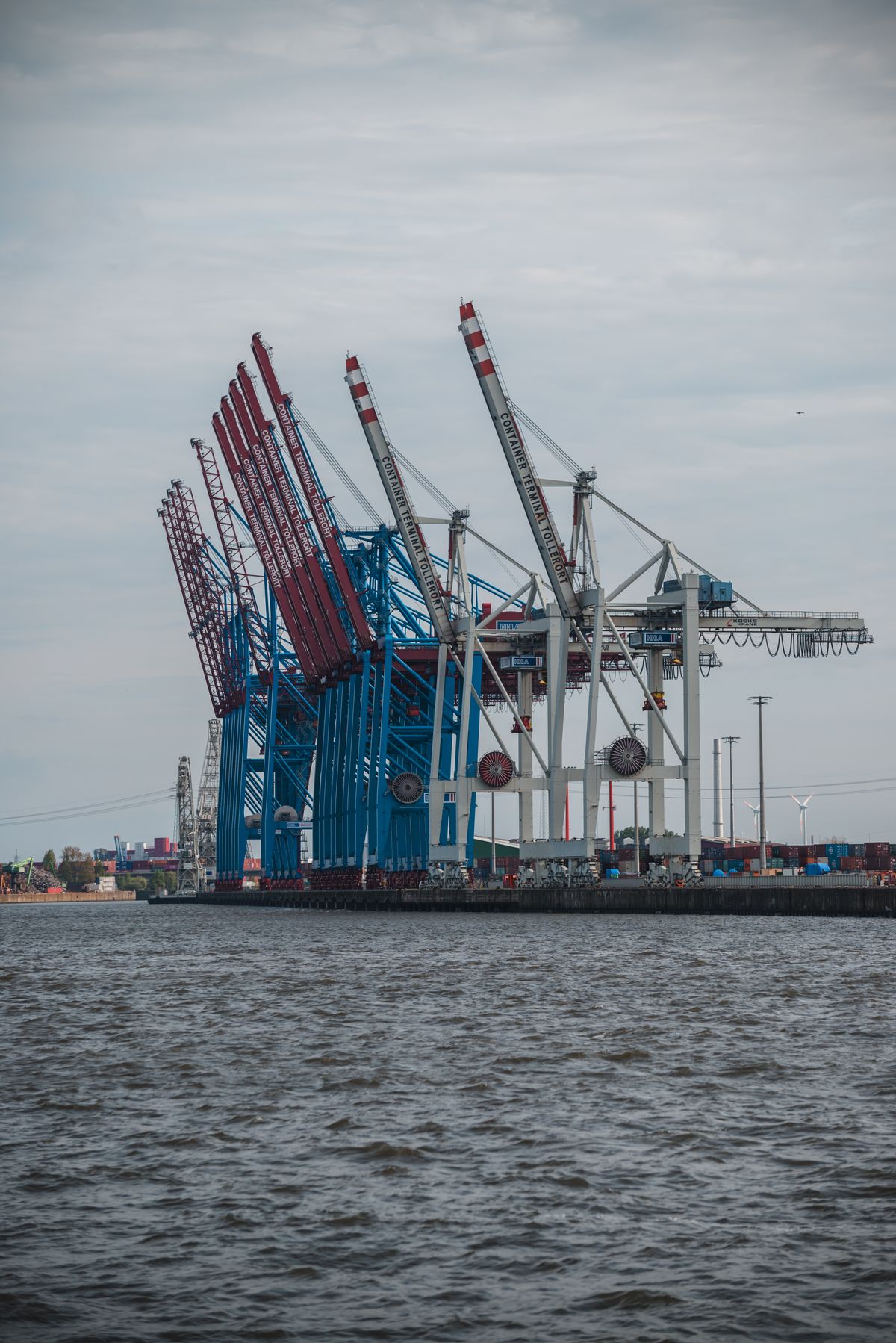 Ship-to-shore container gantry cranes at an Australian transshipment terminal awaiting statutory crane inspection and lifting compliance