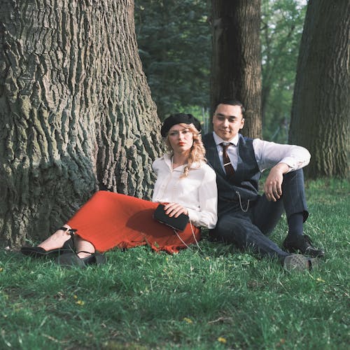 Retro Style Fashion Models Posing in Park