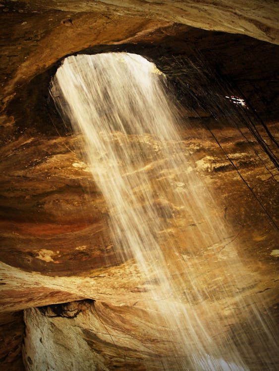 Free Water Falls Inside Cave Stock Photo