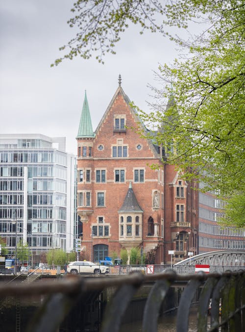 A large red brick building with a clock tower