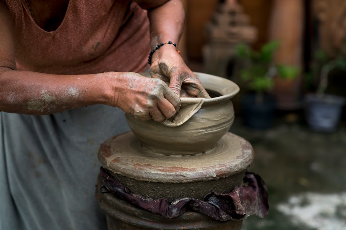 Free Woman Making Clay Pot Stock Photo