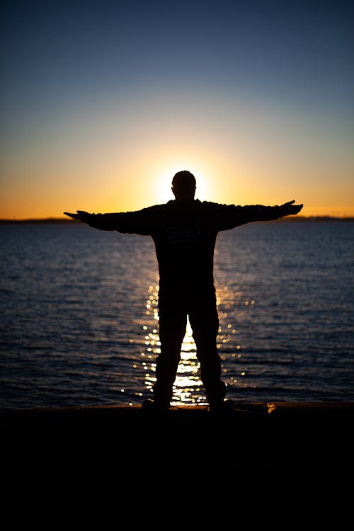 Free stock photo of man, sun, sunset Stock Photo