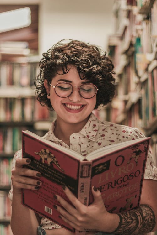 Free Woman Reading Book Stock Photo