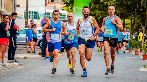 Free Four Men Running on Stock Photo