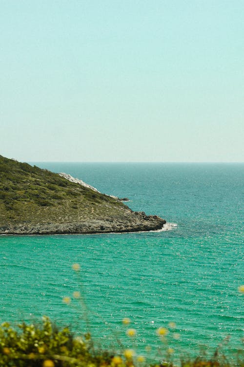 A view of the ocean and a small island