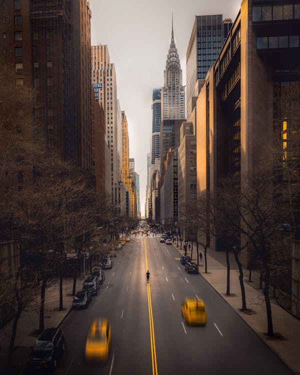 Time Lapse Photography Of Vehicles Passing On Road