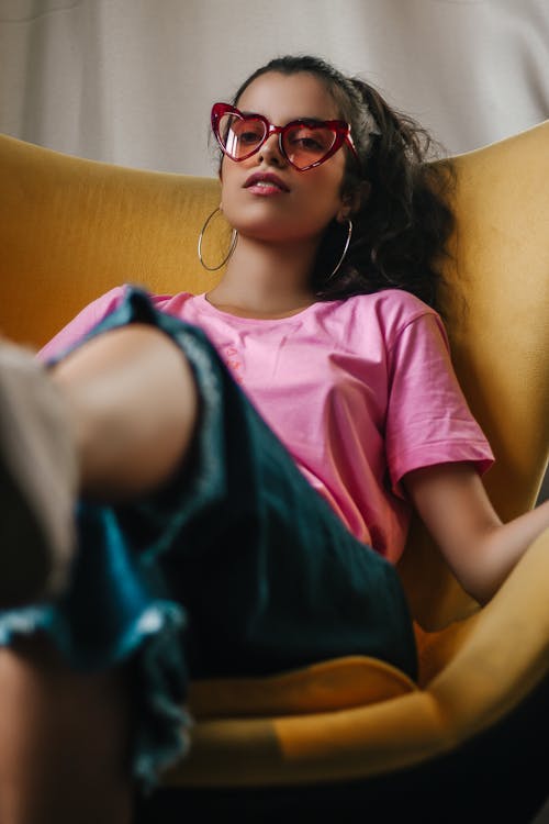 Woman Wearing Sunglasses And Pink Shirt