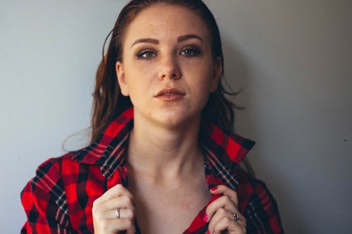 Woman In Red And Black Plaid Button-up Shirt