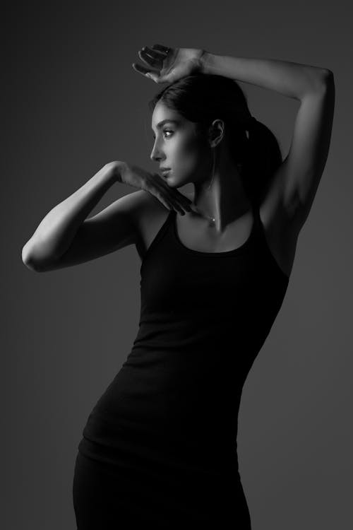 Portrait of Woman in Black Dress in Black and White