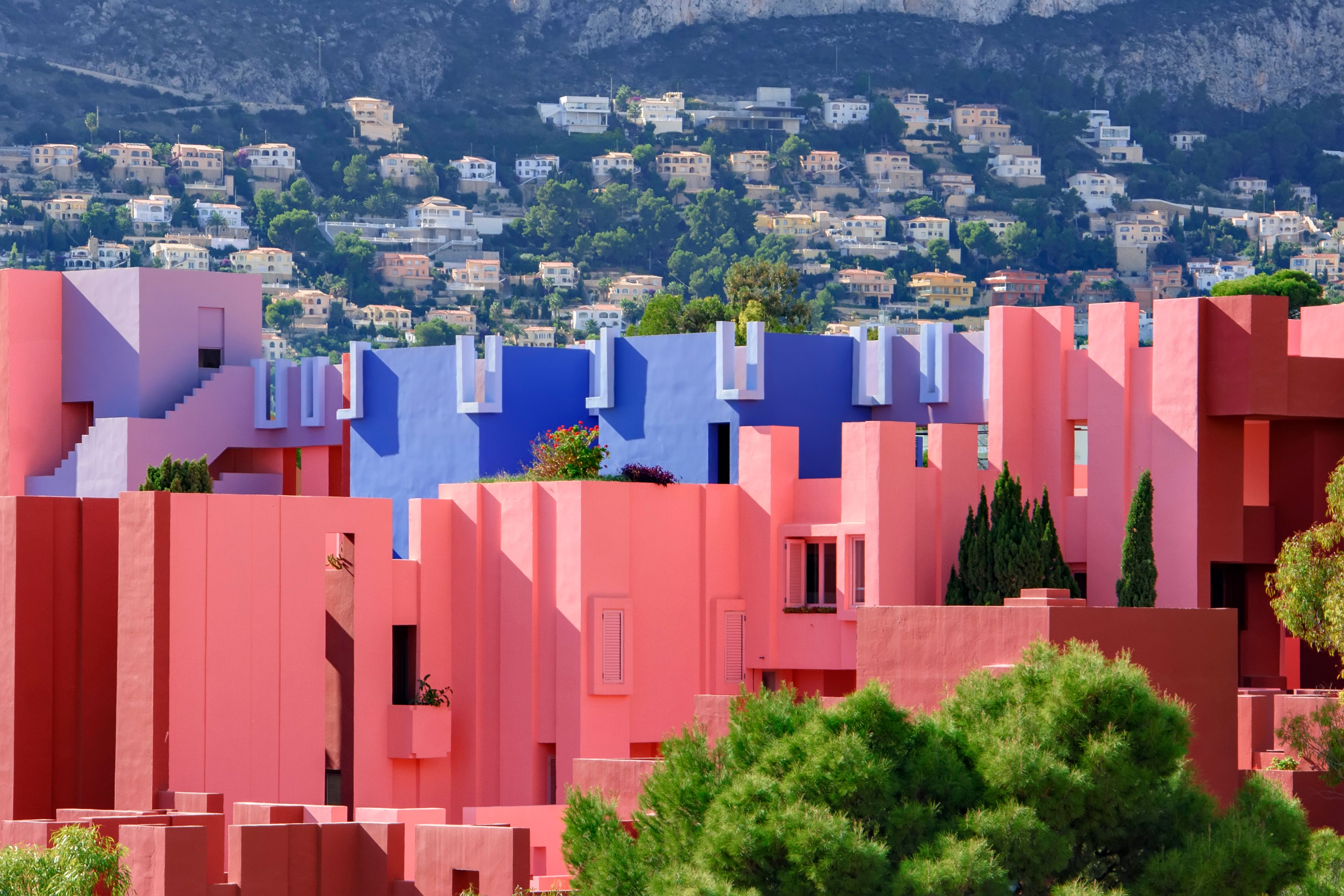Explore the colorful architecture of La Muralla Roja in Calpe, Spain. A modern architectural wonder.