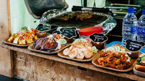 Cooked Foods on Wooden Plate