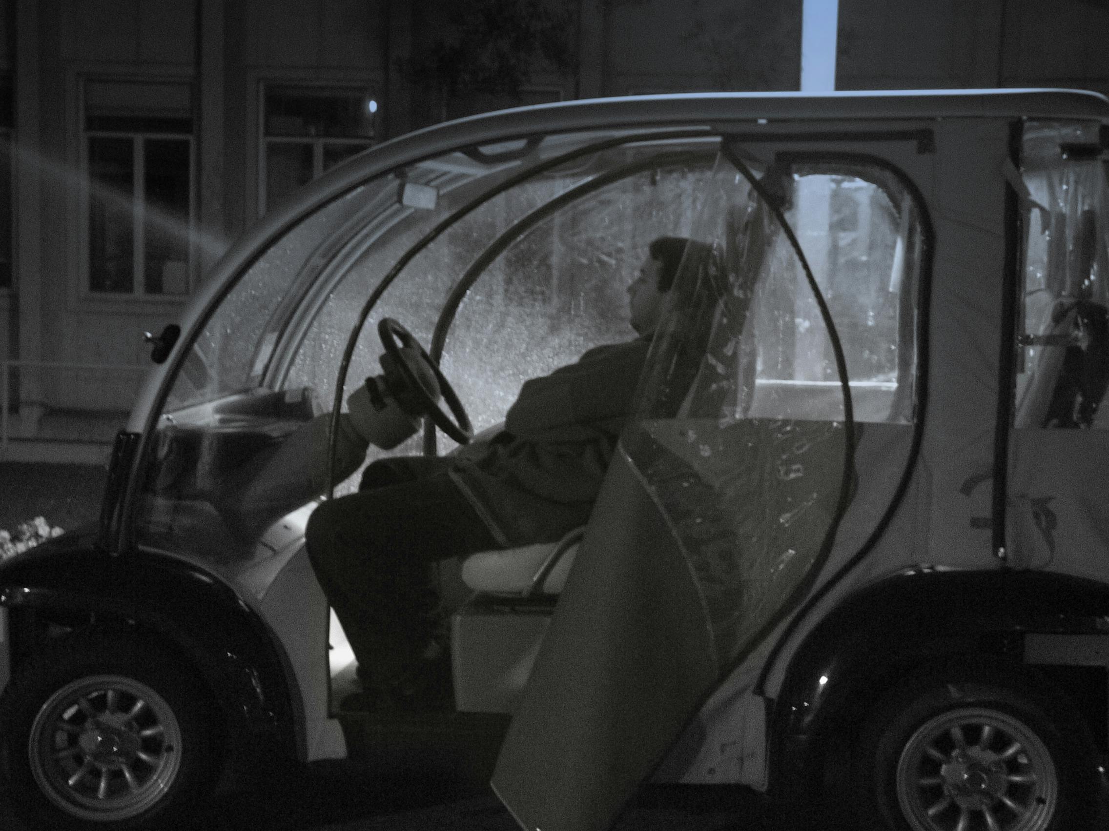 Free stock photo of electric vehicle, man in electric vehicle, man