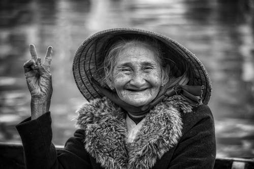 Smiling Elderly Woman in Hat