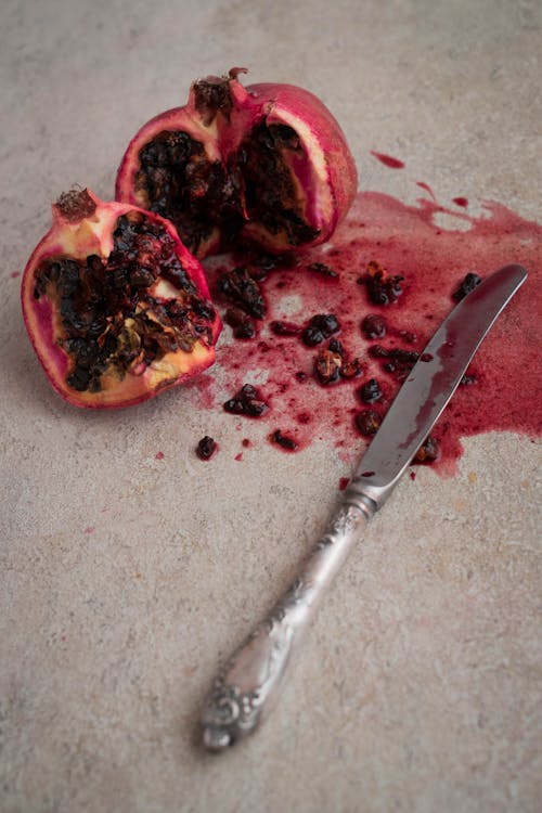 Free Pomegranate and Bread Knife Stock Photo
