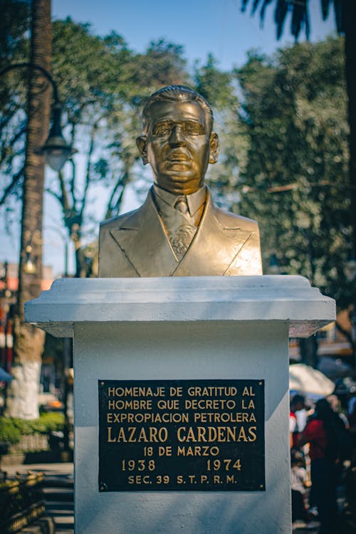 A bust of a man in a suit and tie