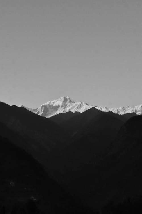 Black and white photo of mountains in the distance