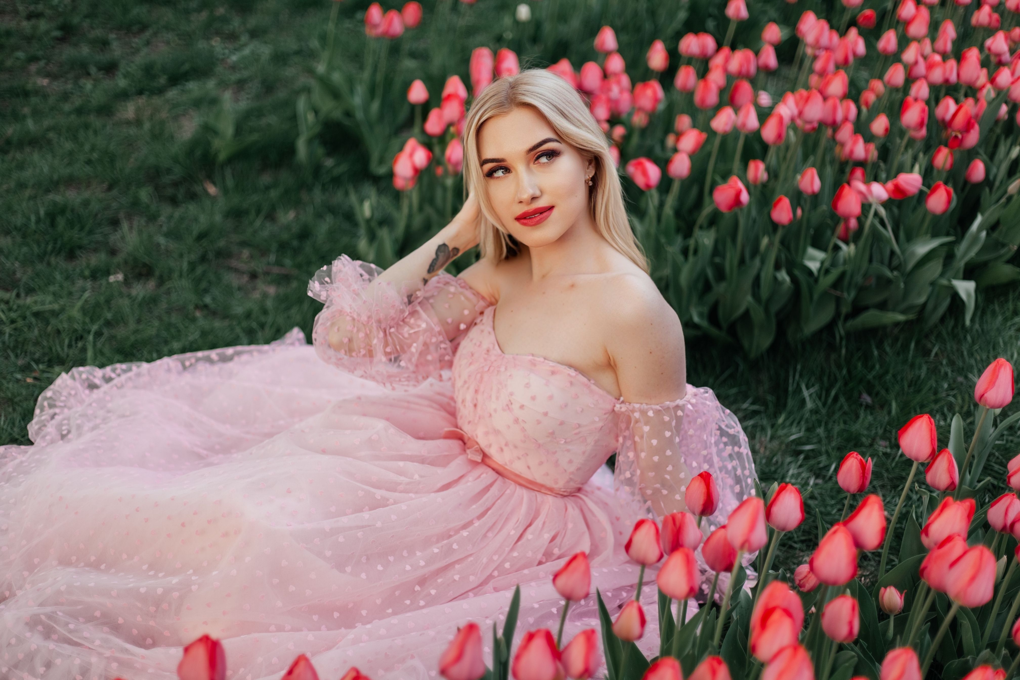 Woman in Long Pink Dress with Flower Bouquet · Free Stock Photo