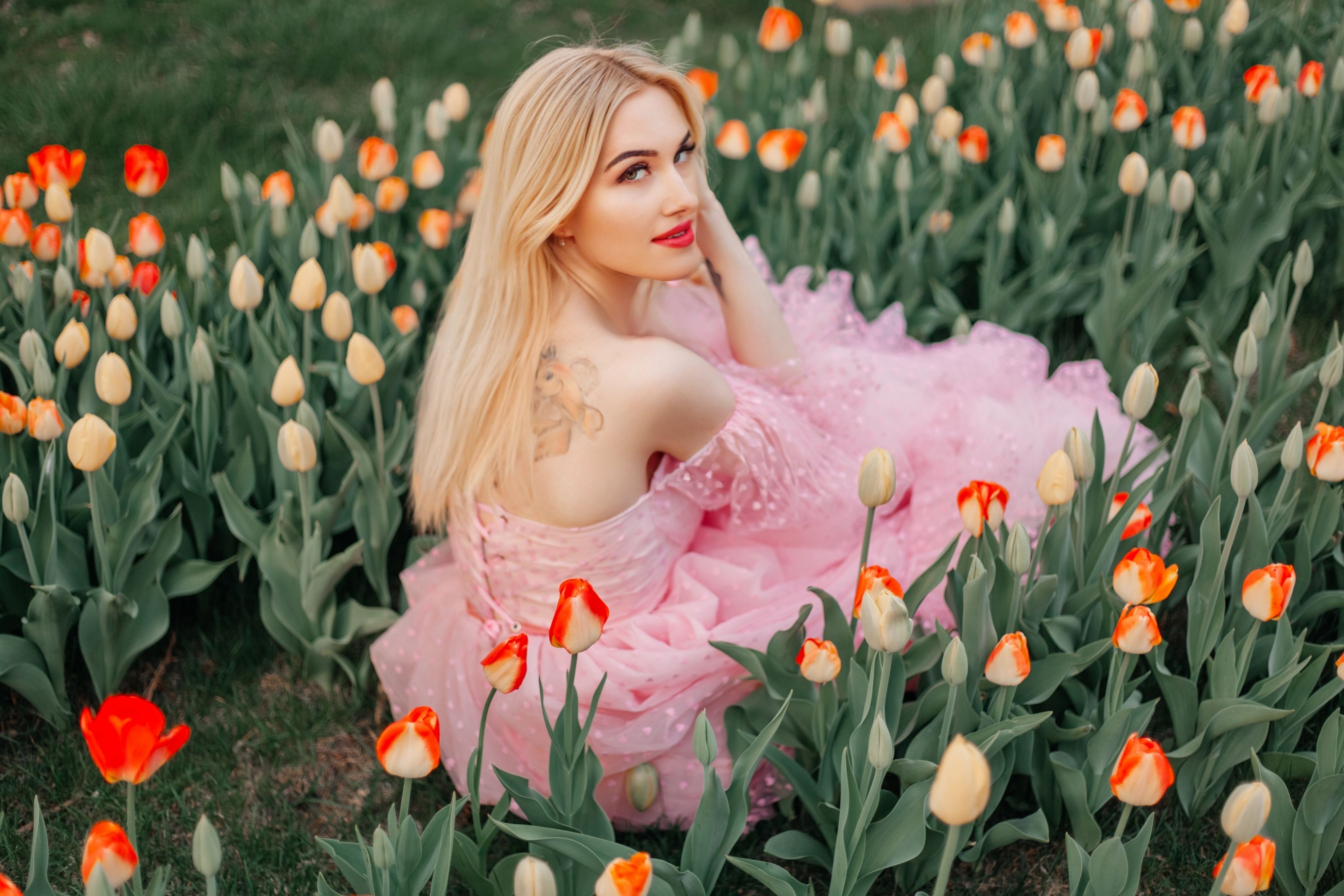 A Woman Sitting on the Ground · Free Stock Photo