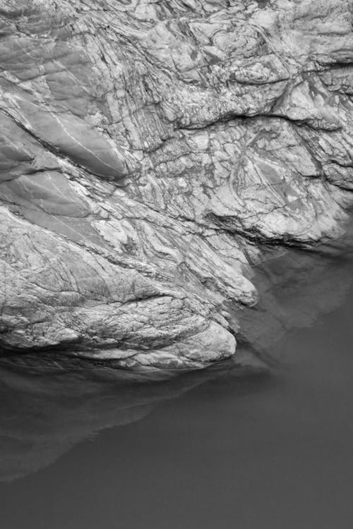 A black and white photo of a rock