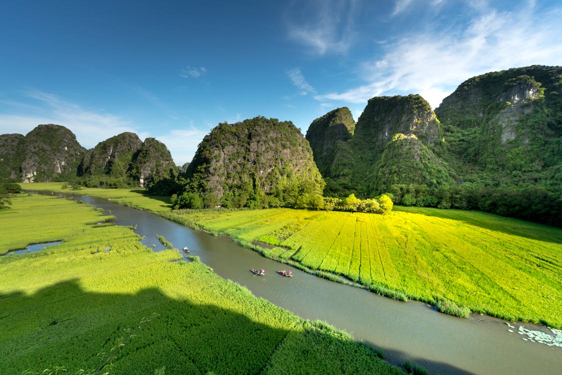 Green Field Near Mountains