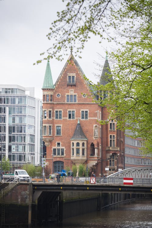 A large red brick building with a clock tower