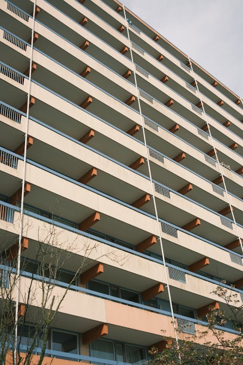 A tall building with balconies and windows